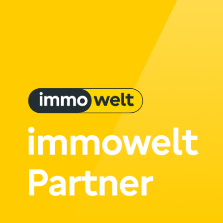 Logo von Immowelt mit dem Text "immowelt Partner" auf gelbem Hintergrund.